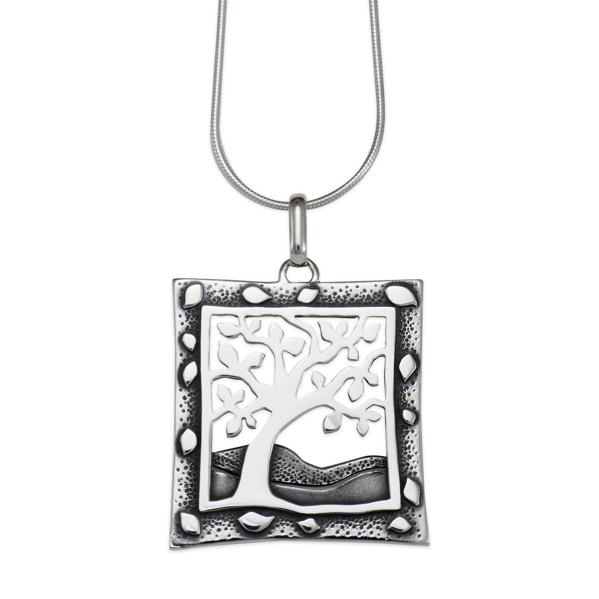 Tree in the wind silver pendant